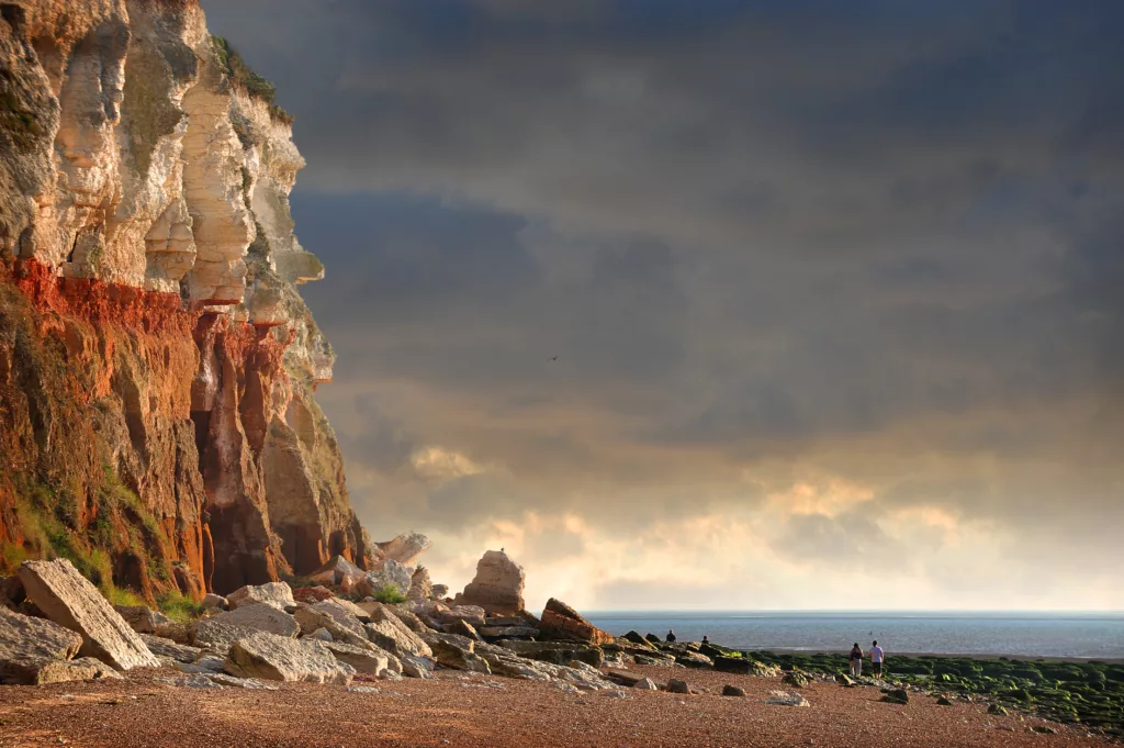 Hunstanton cliffs and beach as dark clouds roll in